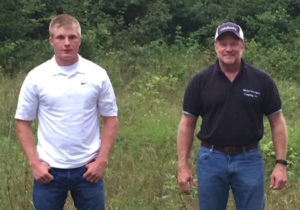 Marty Marler, conservation easement holder with son