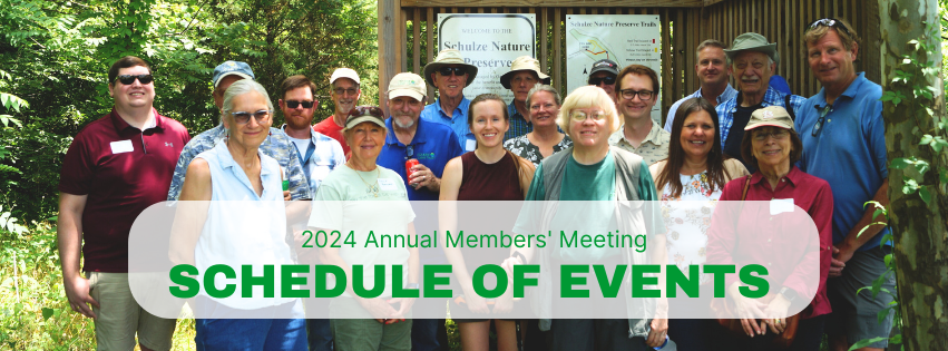 Picture of people posing before a hike outside schulz nature preserve